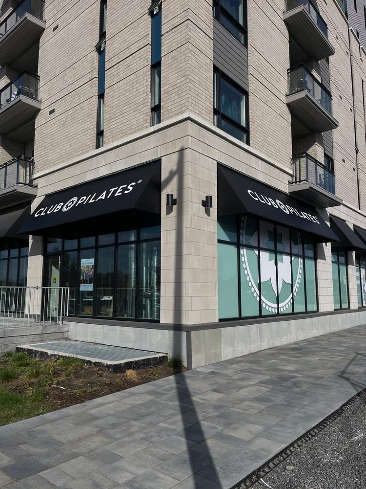 Multi-tenant building storefront sign Ottawa