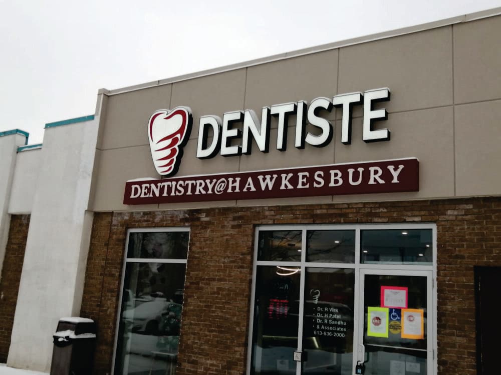 Bilingual channel letter sign installation Eastern Ontario