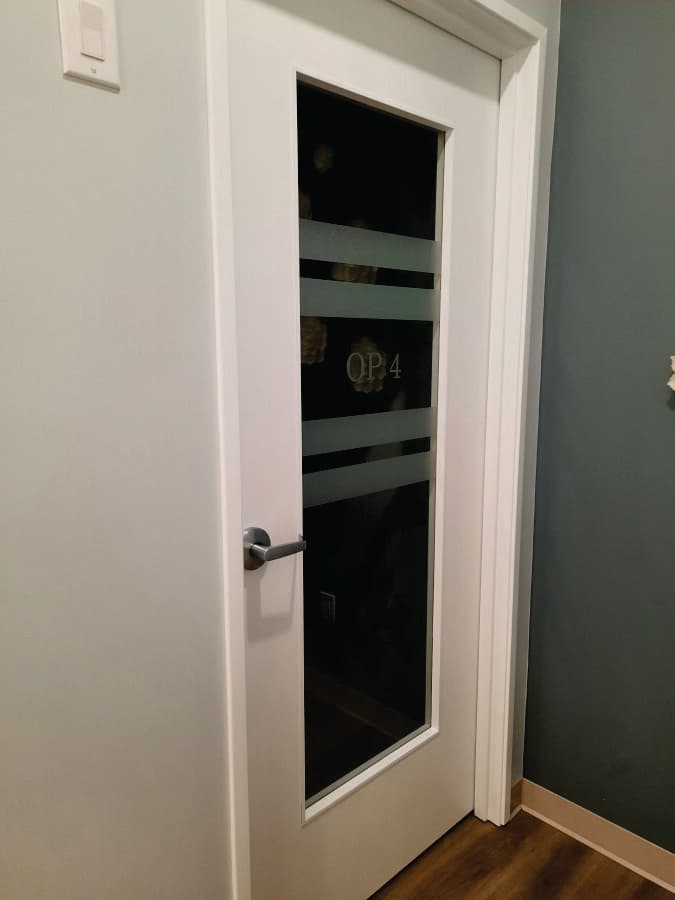 Healthcare clinic frosted glass door treatment room