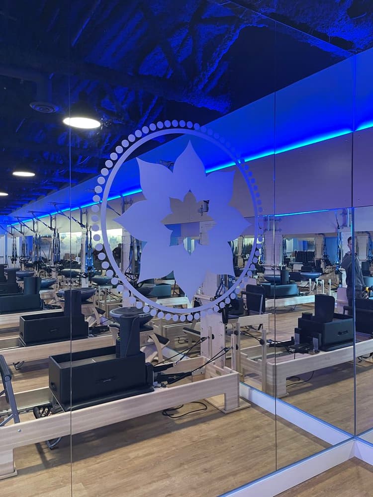 Corporate interior mural — illuminated blue maple leaf