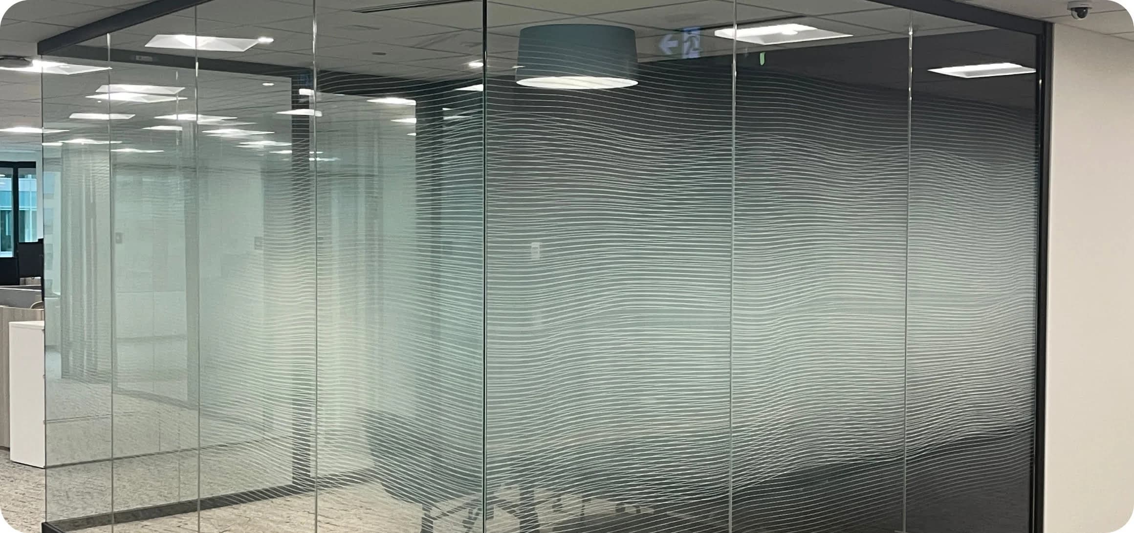 Frosted glass office wall with privacy film