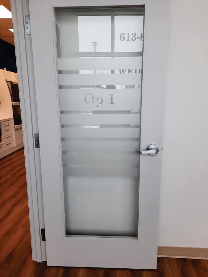 Interior glass with etched window graphic