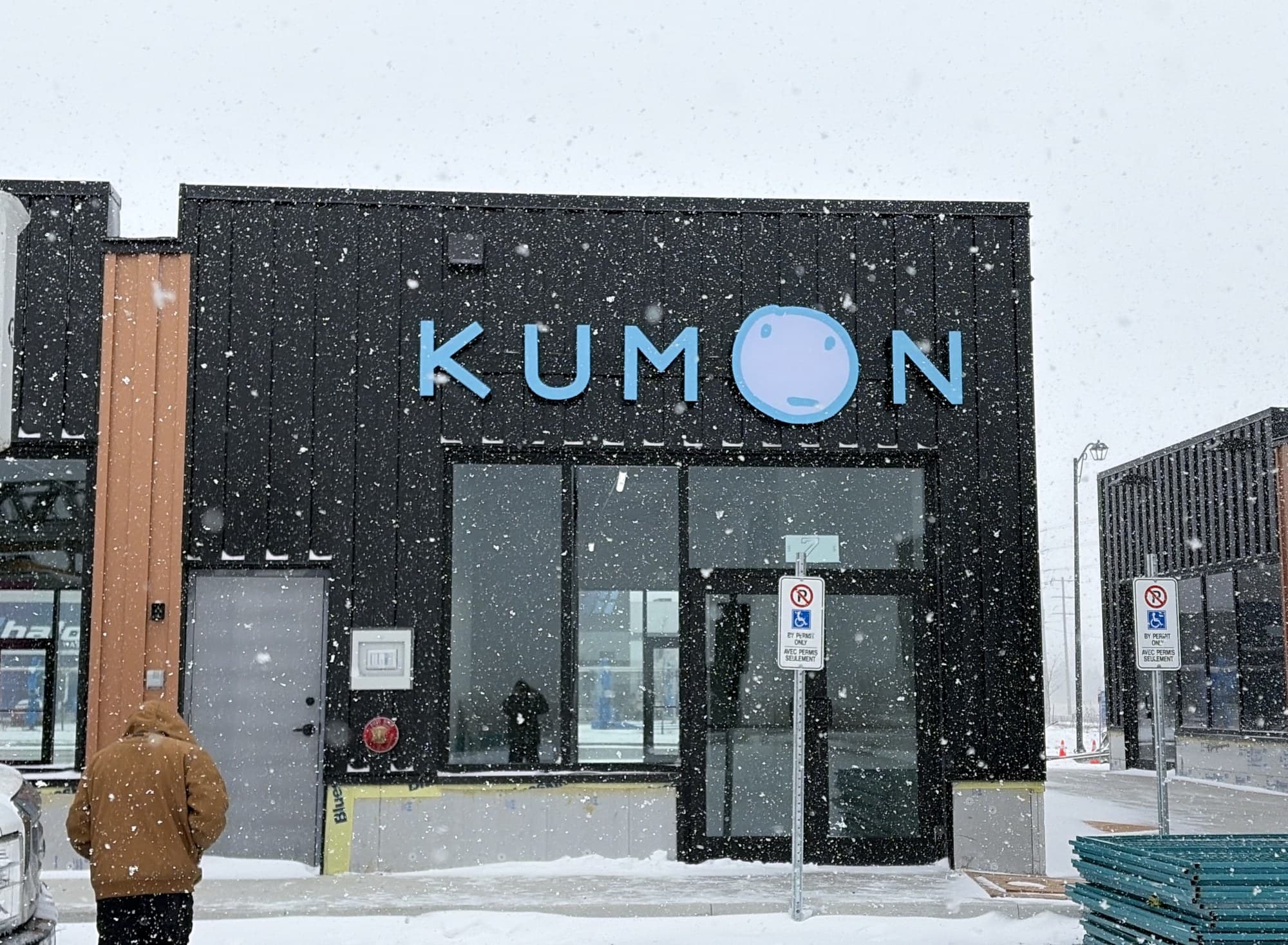Kumon tutoring centre channel letter storefront sign in winter, Ottawa