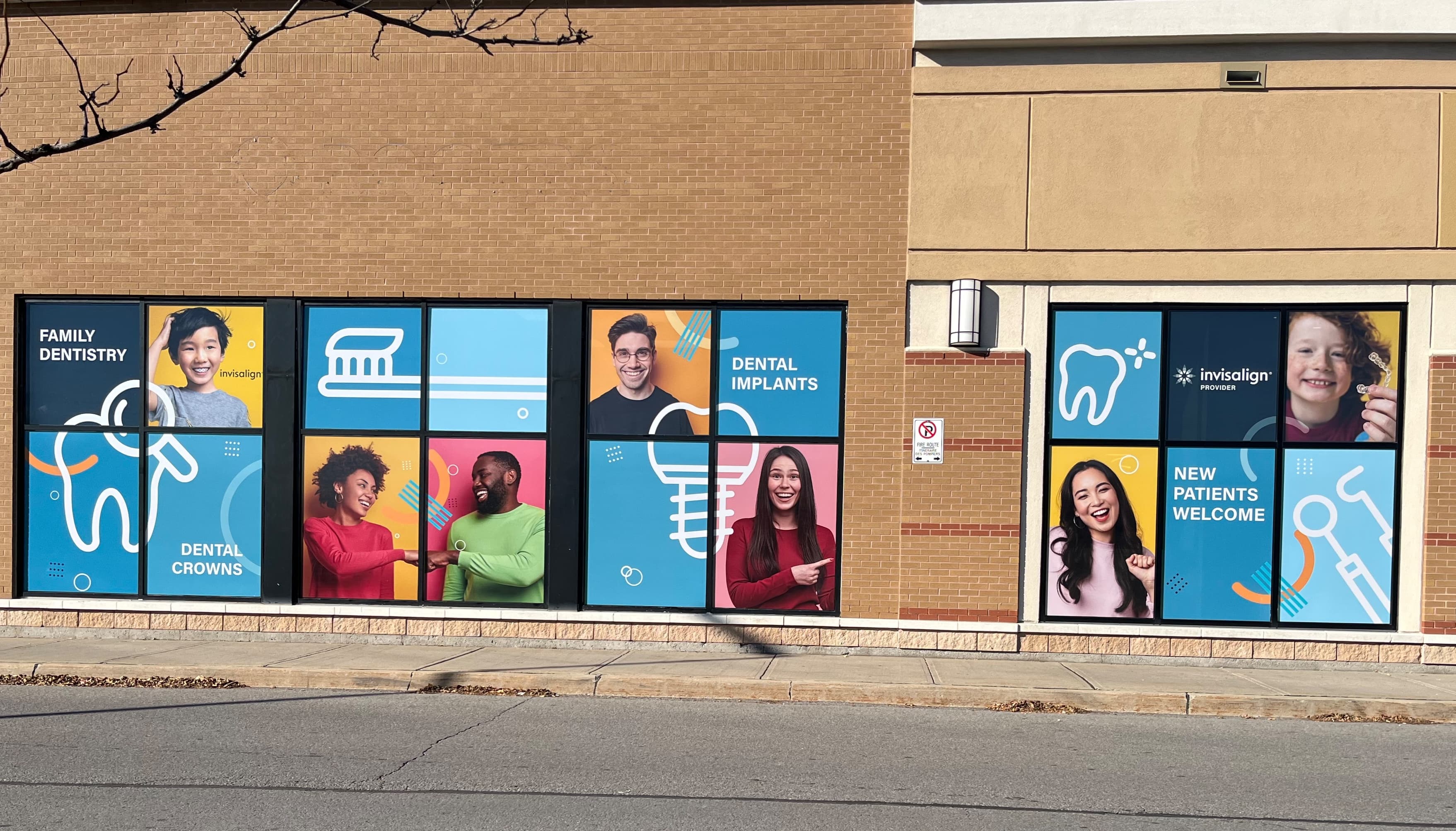 Ottawa Valley Family Dental wide storefront with window graphics across multiple panes