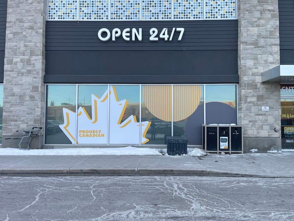 Full coverage window graphics Ottawa gym storefront