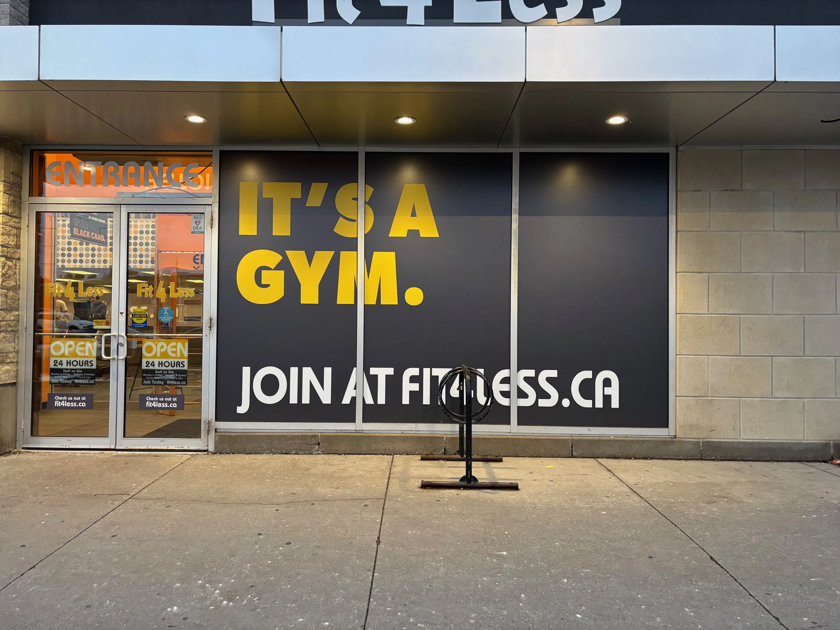 Fit4Less after — "IT'S A GYM" exterior window graphics
